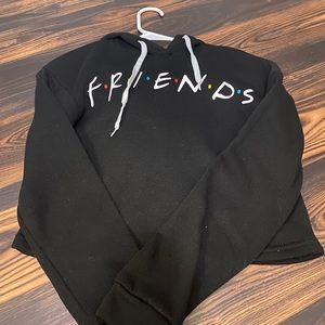black “Friends” crop top
